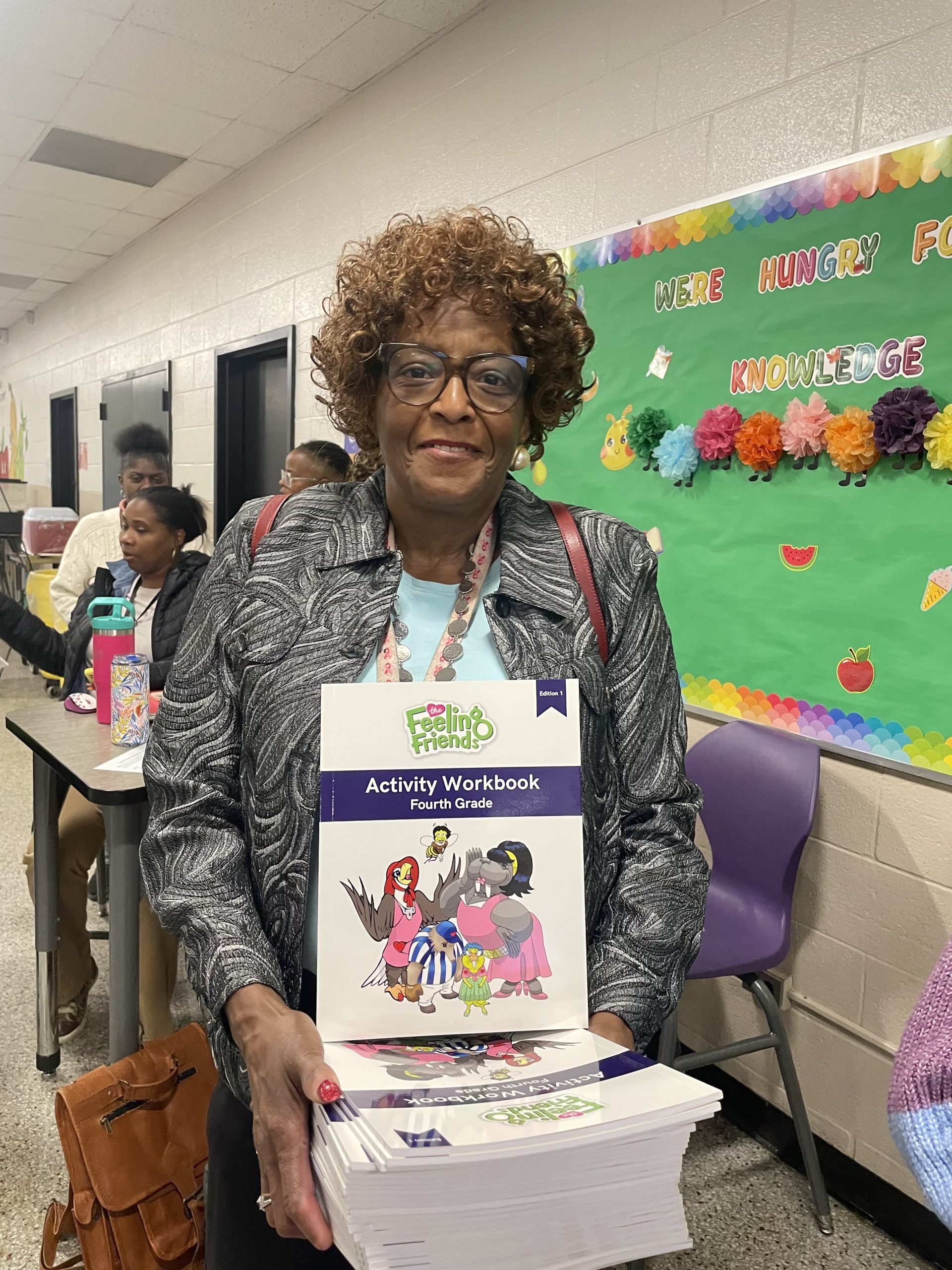 KP Teachers Receive The Feeling Friends Workbooks event photo